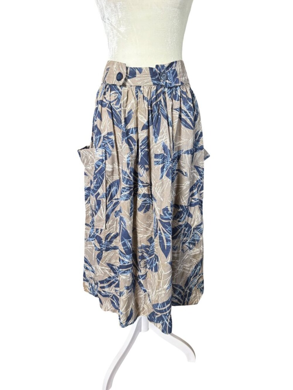Women's tan and blue A-line skirt with button zip closure pockets tie belt